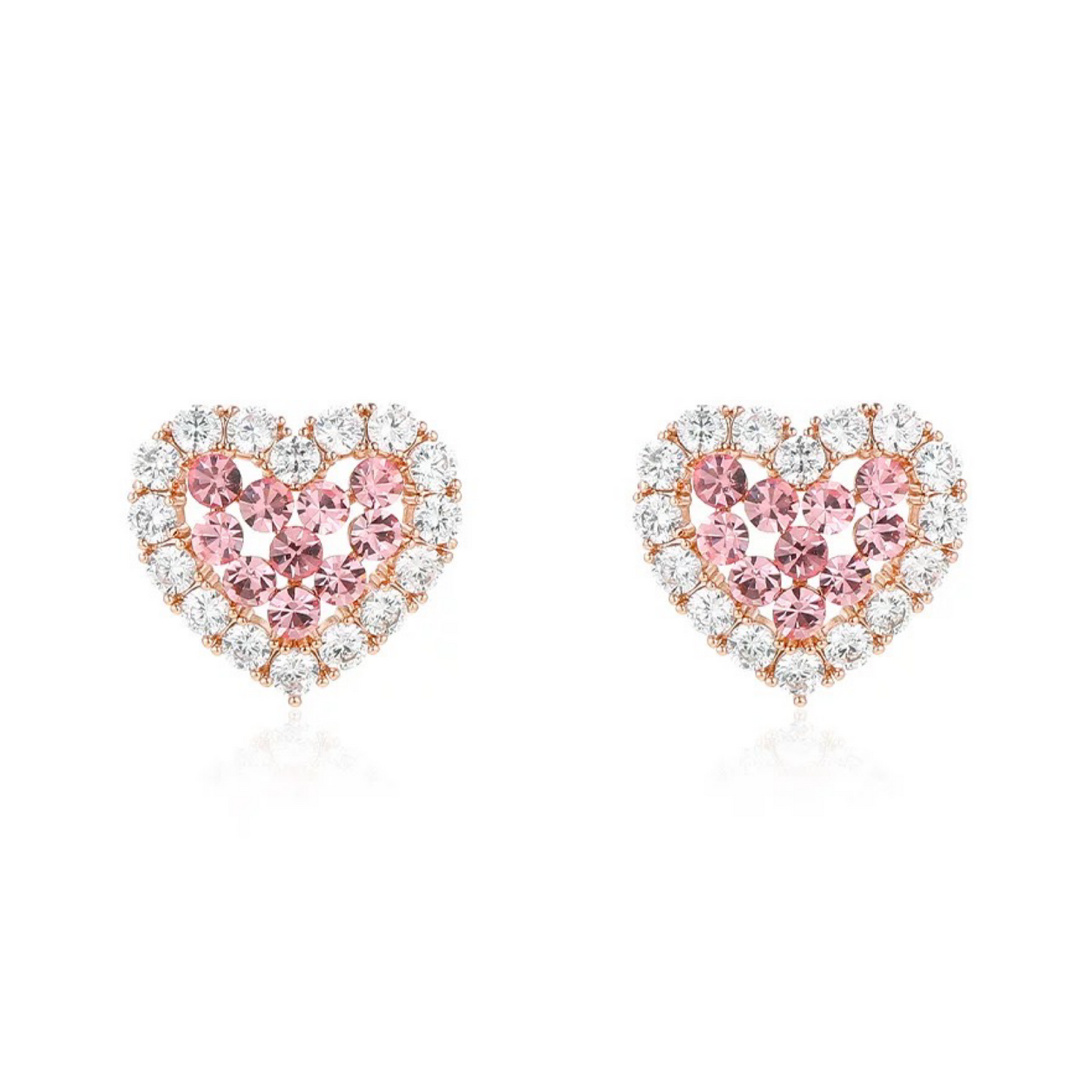 Heart-shaped pink gemstone earrings with rose gold and clear gemstones on a white background