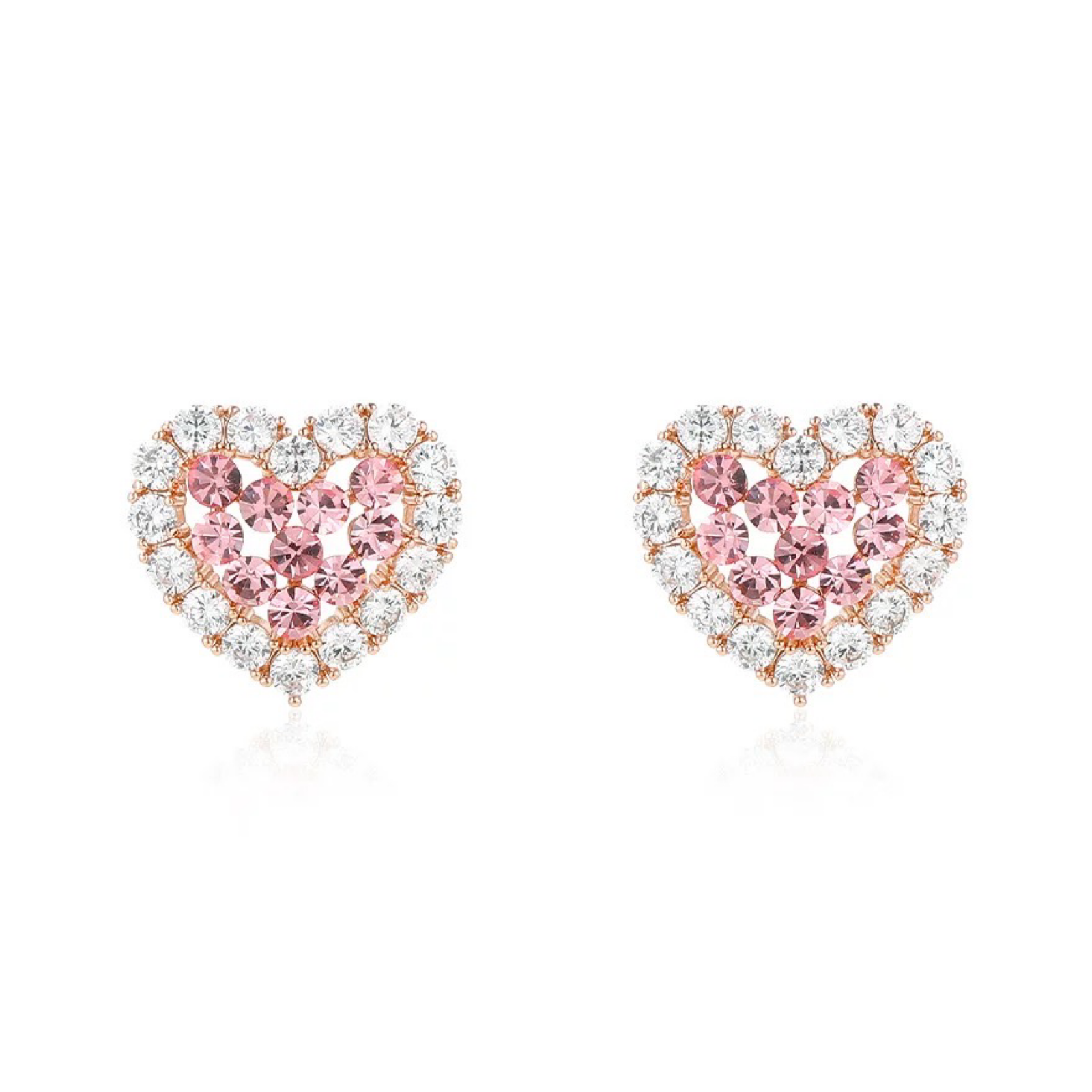 Heart-shaped pink gemstone earrings with rose gold and clear gemstones on a white background