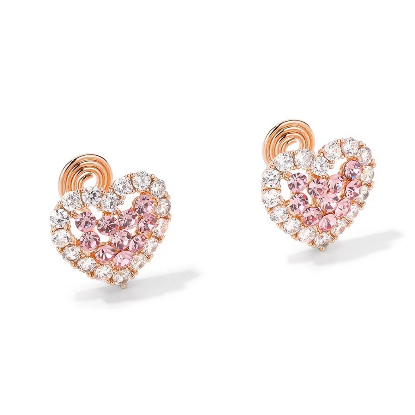 Heart-shaped earrings with pink and clear gemstones on a white background